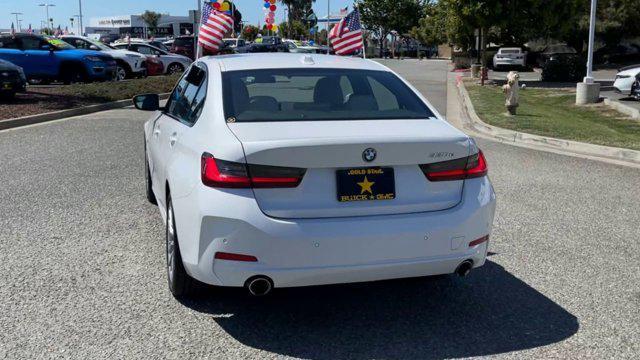 used 2023 BMW 330e car, priced at $34,988