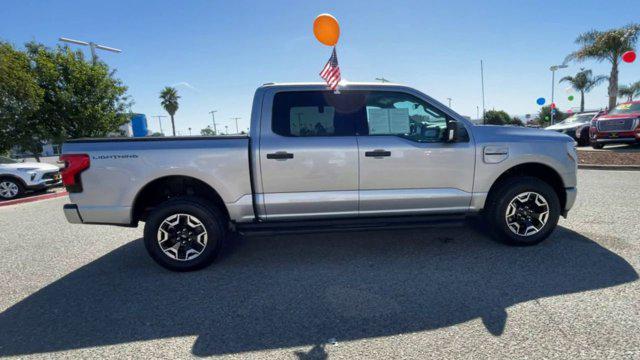 used 2023 Ford F-150 Lightning car, priced at $51,988