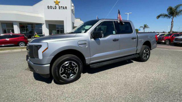 used 2023 Ford F-150 Lightning car, priced at $51,988