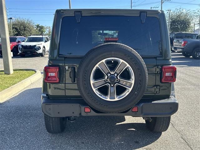 used 2022 Jeep Wrangler Unlimited car, priced at $32,698