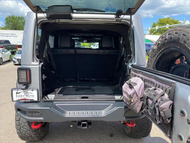 used 2016 Jeep Wrangler Unlimited car, priced at $31,381