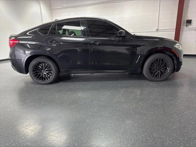 used 2016 BMW X6 M car, priced at $27,853