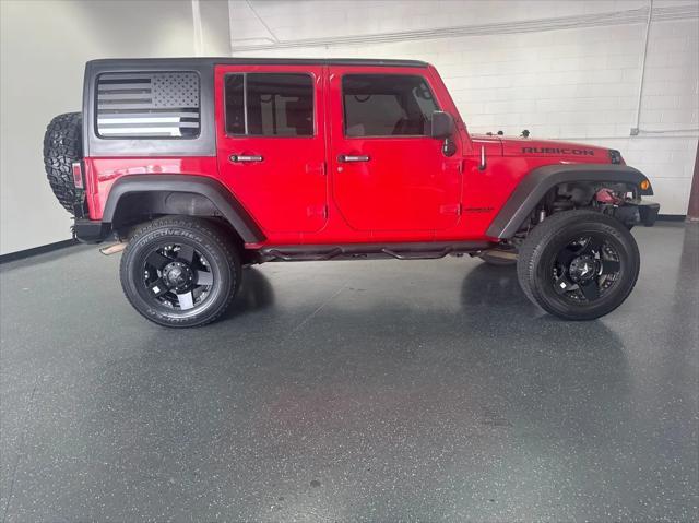 used 2012 Jeep Wrangler Unlimited car, priced at $18,950