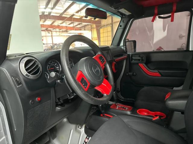 used 2015 Jeep Wrangler Unlimited car, priced at $19,601