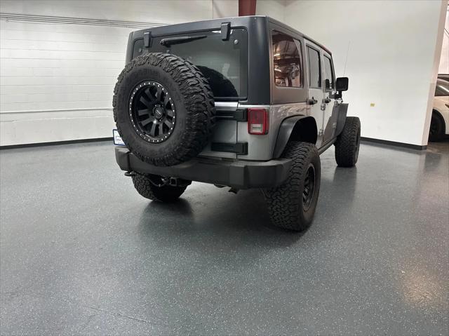 used 2015 Jeep Wrangler Unlimited car, priced at $19,601