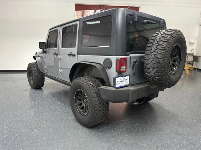 used 2015 Jeep Wrangler Unlimited car, priced at $19,601