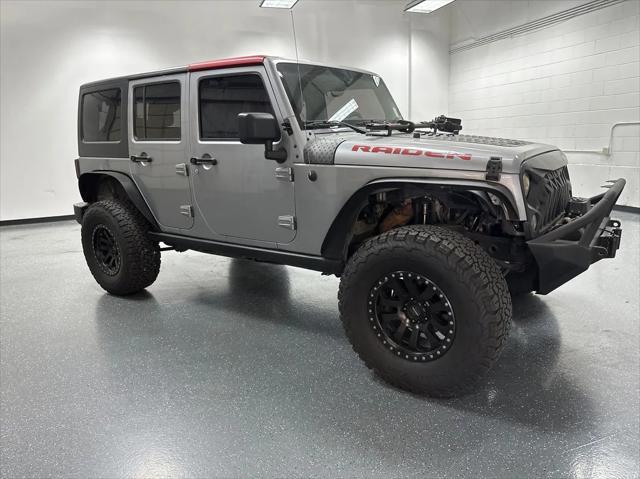 used 2015 Jeep Wrangler Unlimited car, priced at $19,601