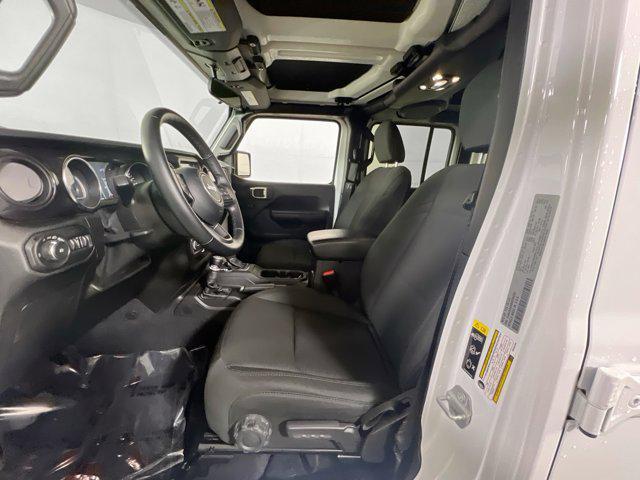used 2021 Jeep Wrangler Unlimited car, priced at $33,057