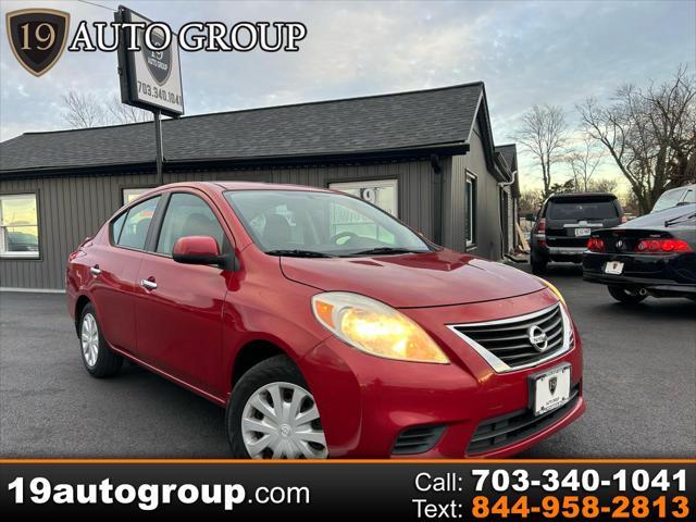 used 2013 Nissan Versa car, priced at $5,999