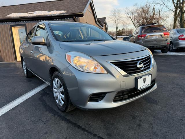 used 2013 Nissan Versa car, priced at $6,499