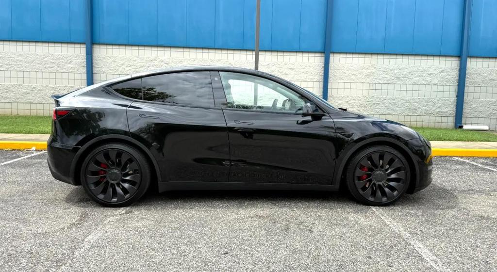used 2021 Tesla Model Y car, priced at $27,475