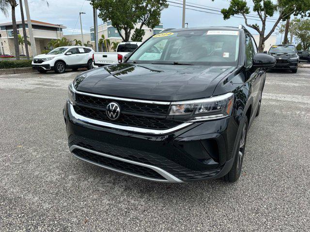 used 2024 Volkswagen Taos car, priced at $22,500