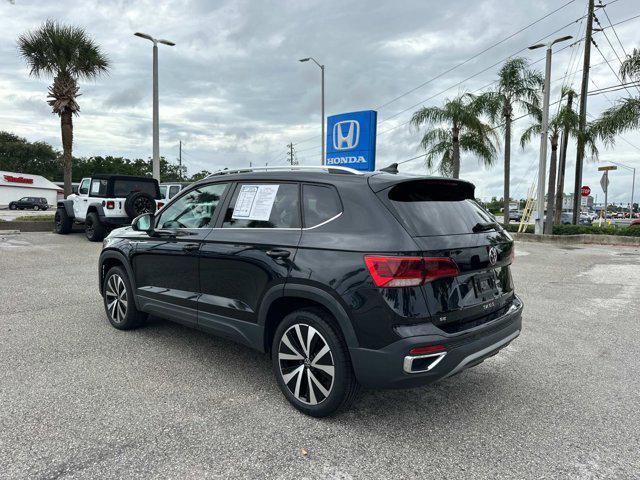 used 2024 Volkswagen Taos car, priced at $22,500