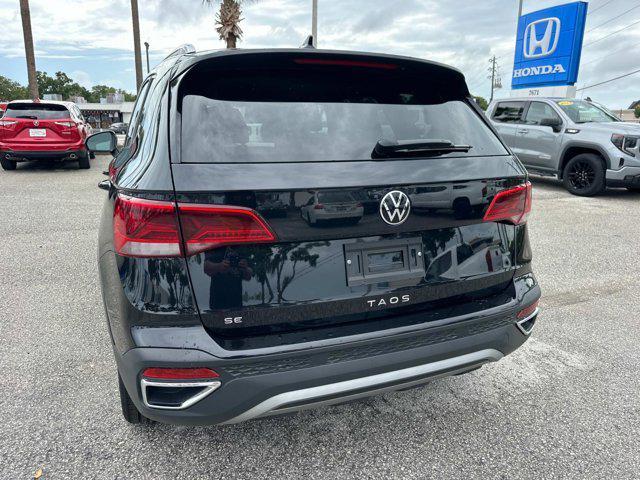 used 2024 Volkswagen Taos car, priced at $22,500