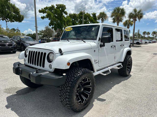 used 2018 Jeep Wrangler JK Unlimited car, priced at $26,998