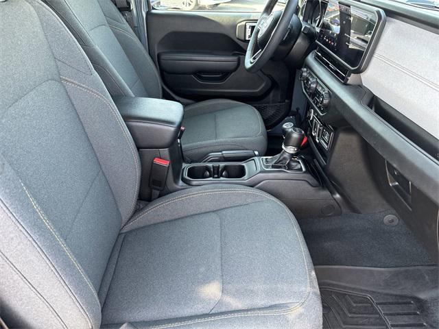 used 2024 Jeep Wrangler car, priced at $35,862