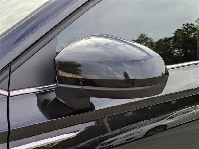 used 2023 Volkswagen Taos car, priced at $16,205