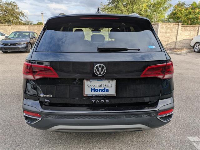 used 2023 Volkswagen Taos car, priced at $16,205