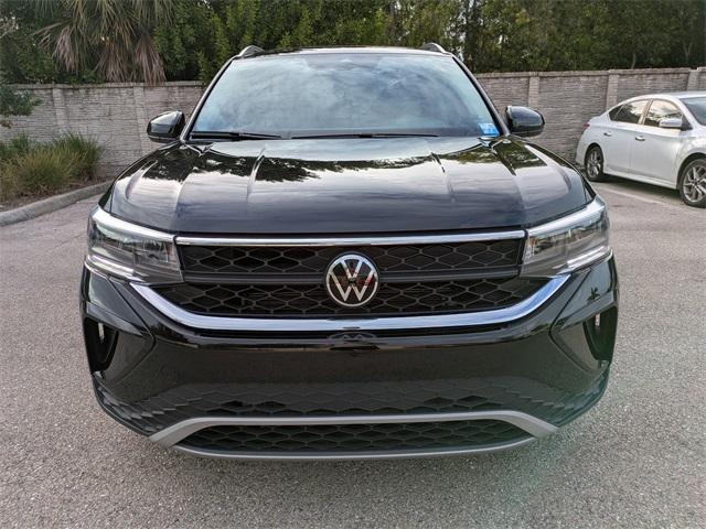 used 2023 Volkswagen Taos car, priced at $16,205