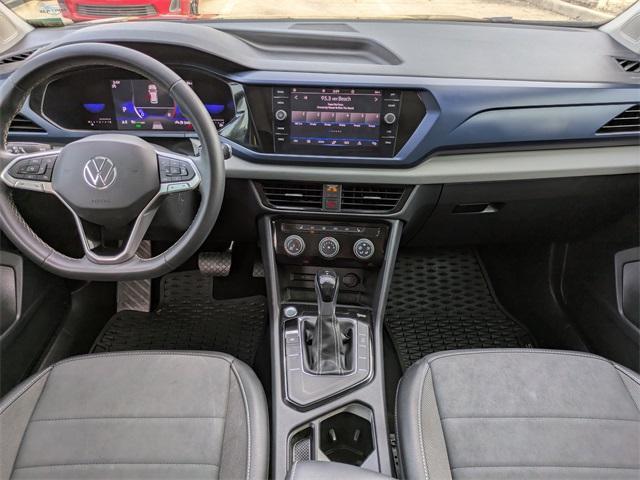 used 2023 Volkswagen Taos car, priced at $16,205