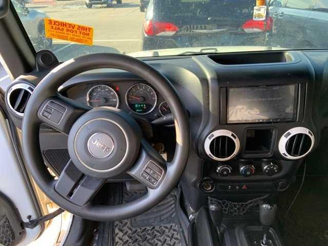 used 2013 Jeep Wrangler car, priced at $11,750