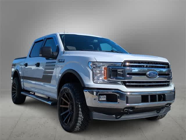 used 2018 Ford F-150 car, priced at $25,988