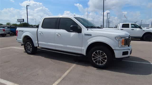 used 2018 Ford F-150 car, priced at $25,050