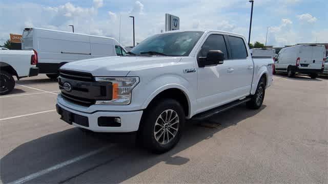 used 2018 Ford F-150 car, priced at $25,050