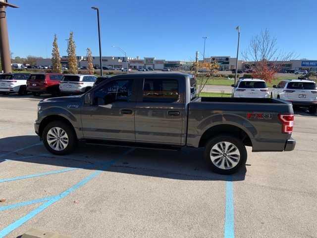 used 2018 Ford F-150 car, priced at $23,538