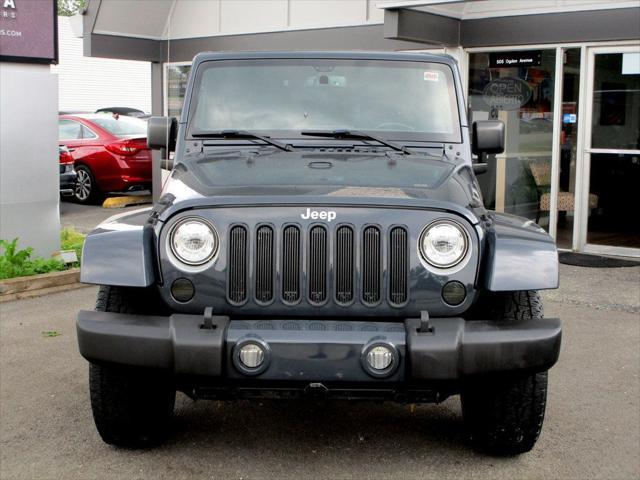 used 2018 Jeep Wrangler JK Unlimited car, priced at $22,985