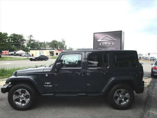 used 2018 Jeep Wrangler JK Unlimited car, priced at $21,985
