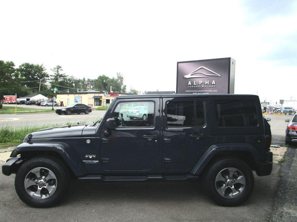 used 2018 Jeep Wrangler JK Unlimited car, priced at $21,985