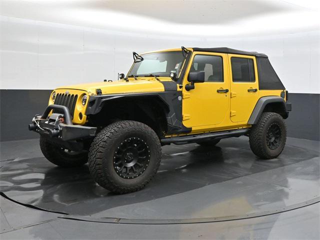 used 2011 Jeep Wrangler Unlimited car, priced at $15,000