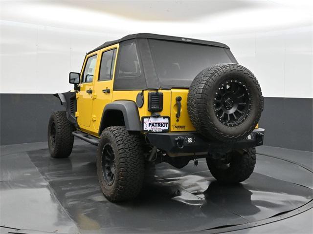 used 2011 Jeep Wrangler Unlimited car, priced at $15,000