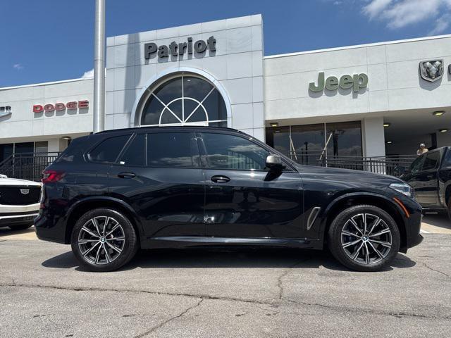 used 2022 BMW X5 car, priced at $50,000