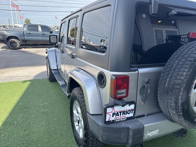 used 2014 Jeep Wrangler Unlimited car, priced at $12,888