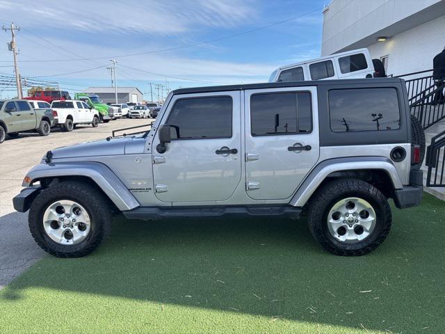 used 2014 Jeep Wrangler Unlimited car, priced at $12,888
