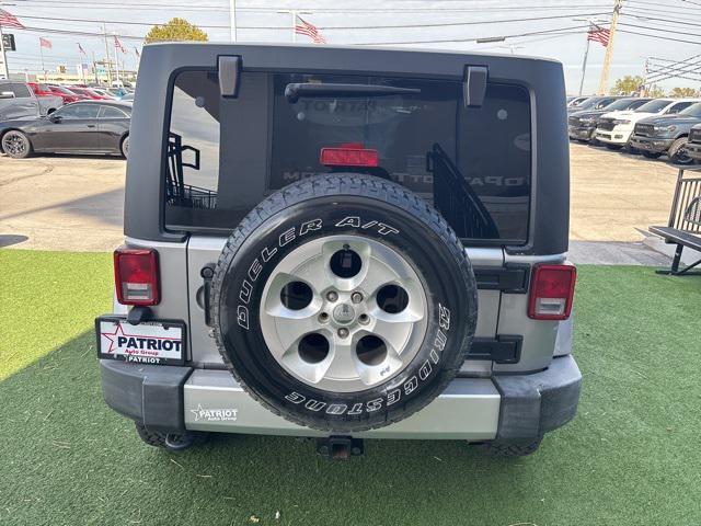 used 2014 Jeep Wrangler Unlimited car, priced at $12,888