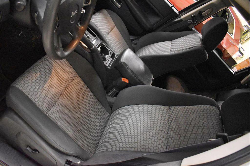 used 2009 Jeep Grand Cherokee car, priced at $9,899