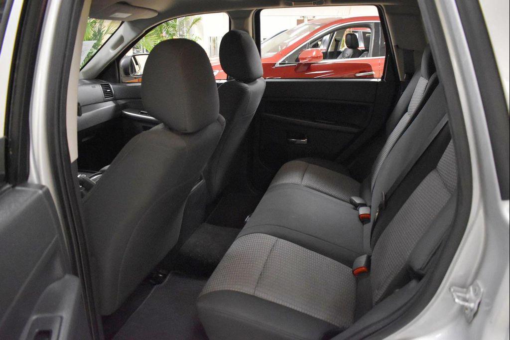 used 2009 Jeep Grand Cherokee car, priced at $9,899