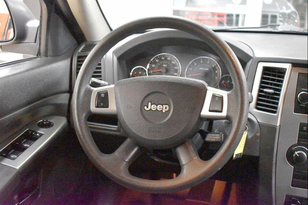 used 2009 Jeep Grand Cherokee car, priced at $9,899