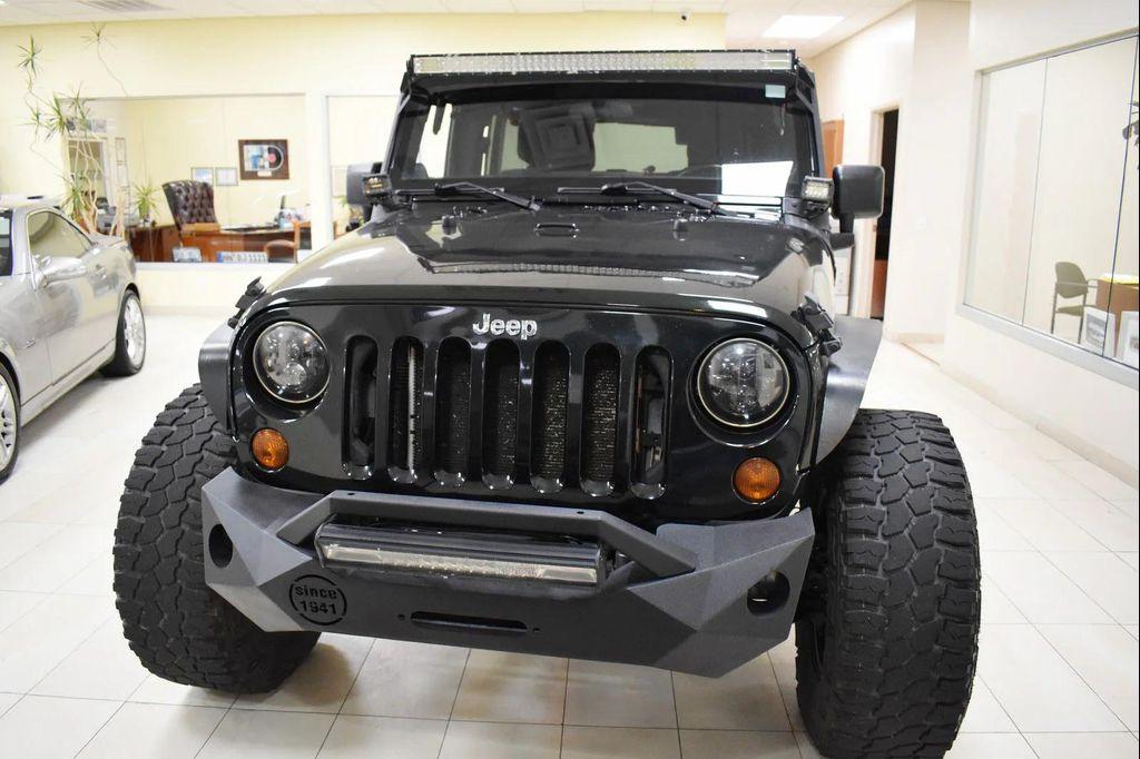 used 2012 Jeep Wrangler Unlimited car, priced at $14,899