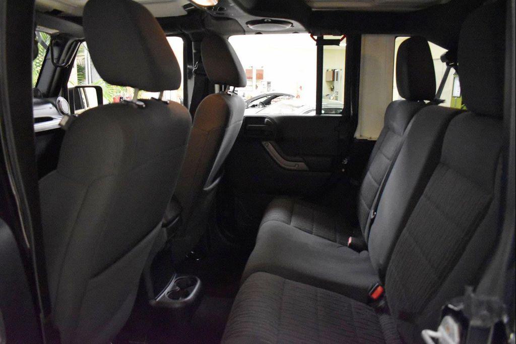 used 2012 Jeep Wrangler Unlimited car, priced at $14,899