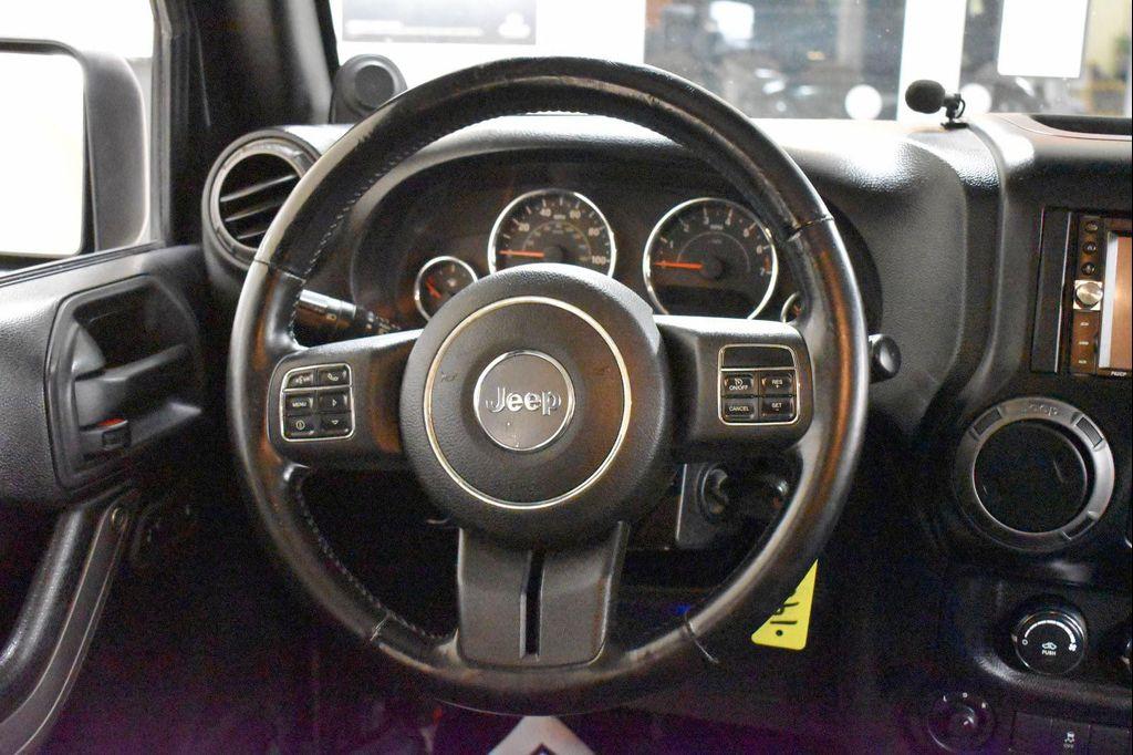 used 2012 Jeep Wrangler Unlimited car, priced at $14,899