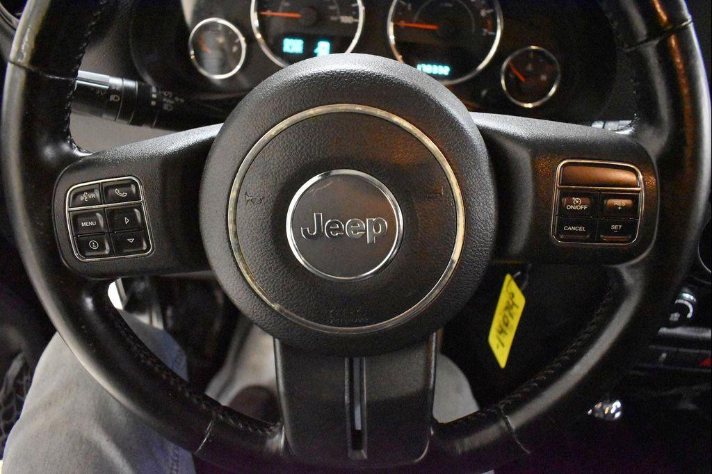 used 2012 Jeep Wrangler Unlimited car, priced at $14,899