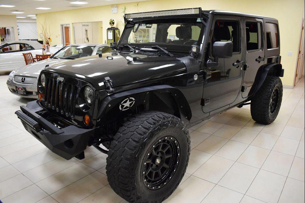 used 2012 Jeep Wrangler Unlimited car, priced at $14,899