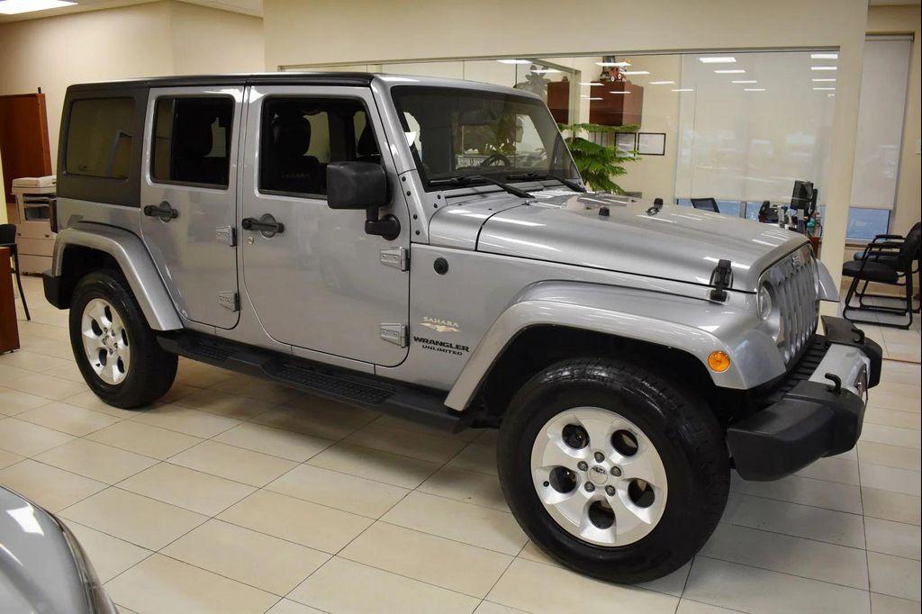 used 2014 Jeep Wrangler Unlimited car, priced at $16,599