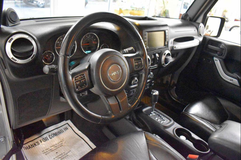 used 2014 Jeep Wrangler Unlimited car, priced at $16,599