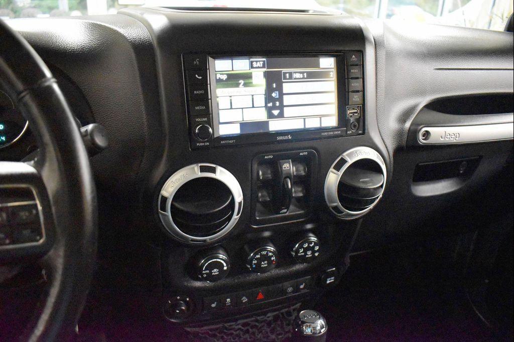 used 2014 Jeep Wrangler Unlimited car, priced at $16,599