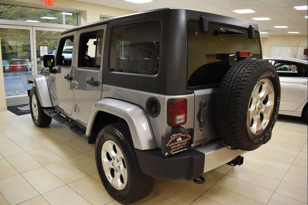 used 2014 Jeep Wrangler Unlimited car, priced at $16,599